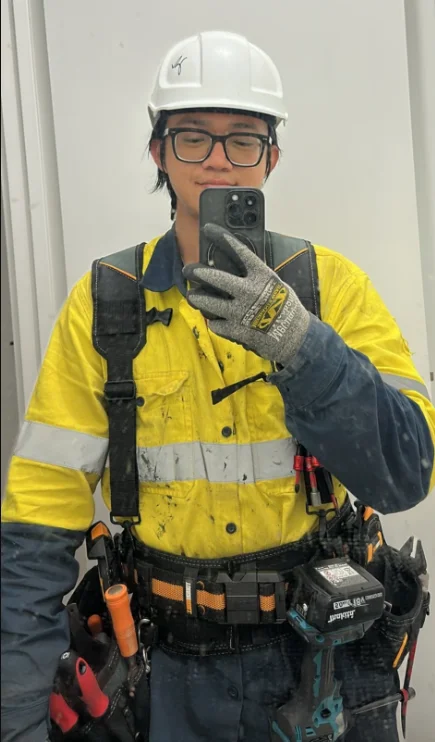 Haomin Yang working on a construction site