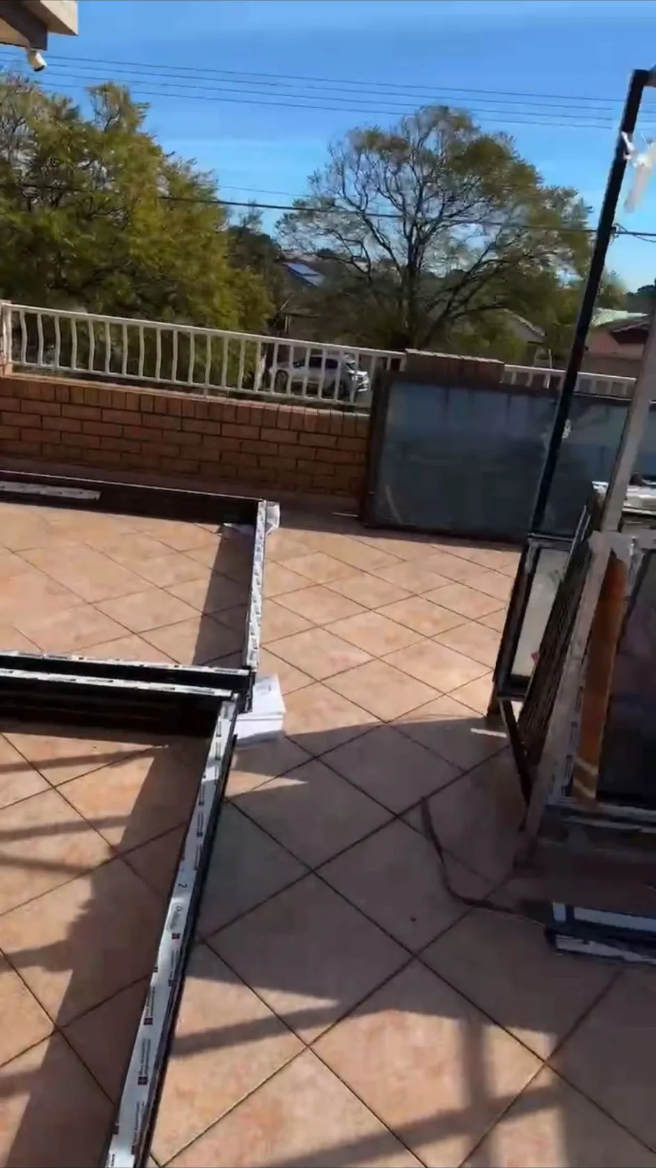 Door and frame components positioned on site during installation work